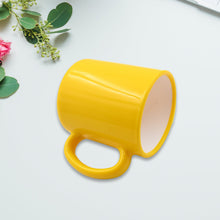 Designer coffee mug with spoon, perfect for gifting