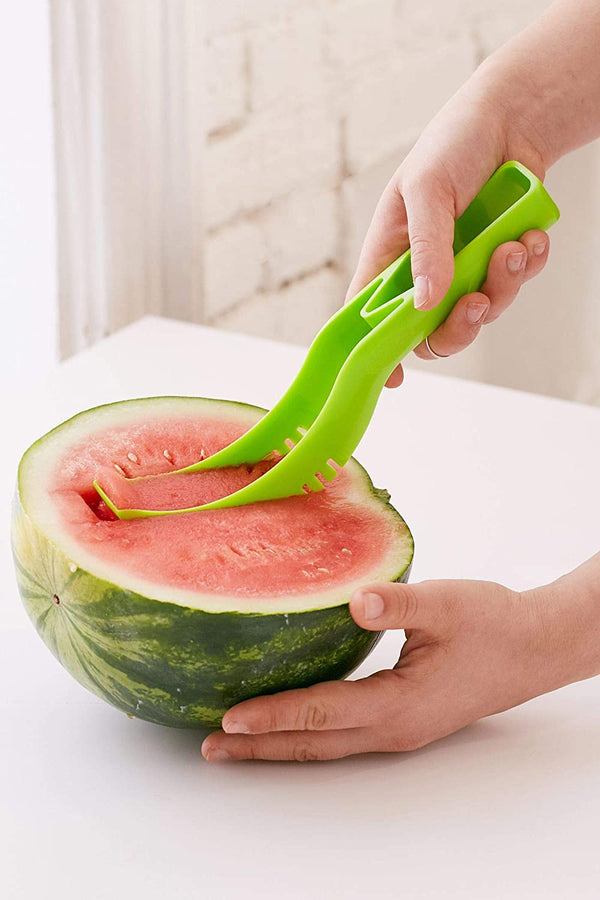 Plastic watermelon cutter slicer for easy and precise cutting of watermelon slices.