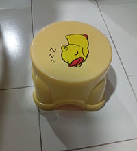 Portable plastic stool with anti-slip design, strong and versatile for indoor and outdoor use.